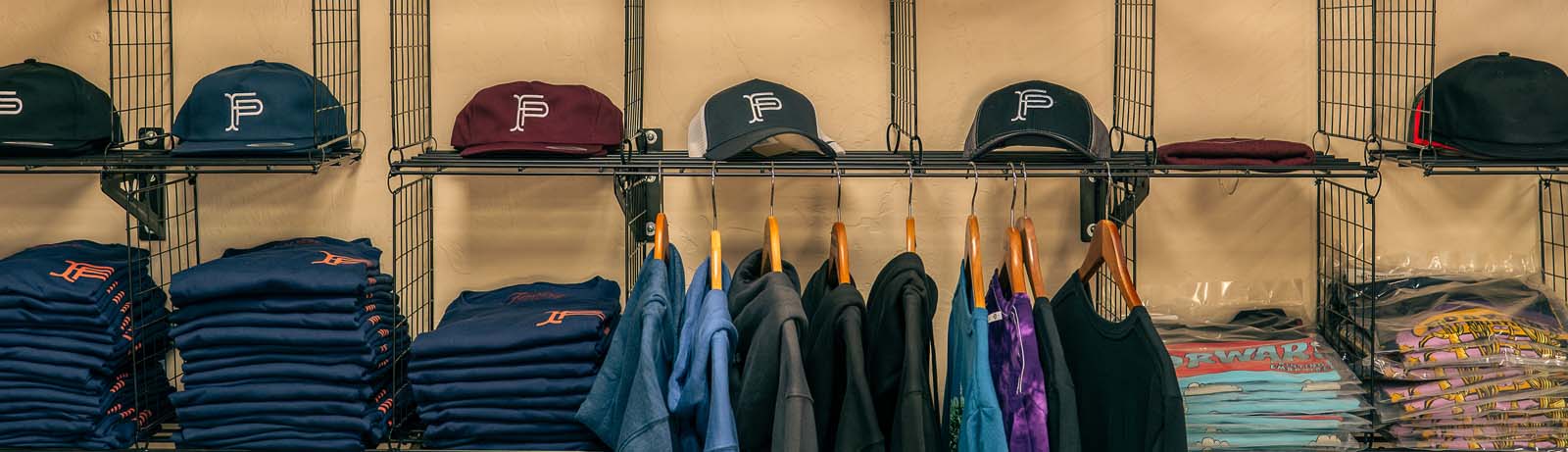 showroom of t-shirts and hats
